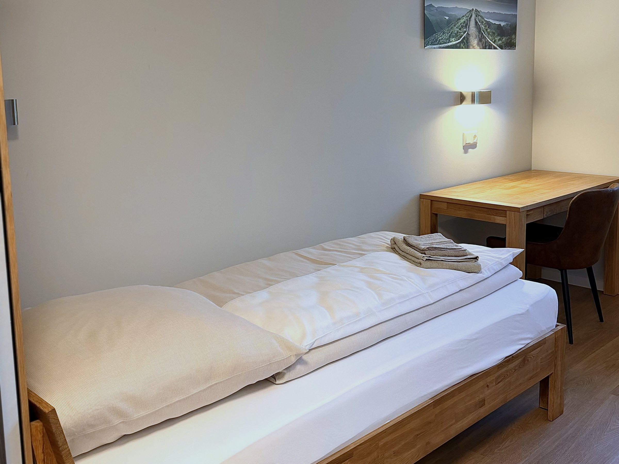 Einzelzimmer mit Schreibtisch im City Event Hotel Dinslaken